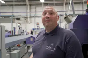 Work with Astec Precision: Join our Team 7 Astec Precision Team Member at Sliding Head CNC Turning Machine